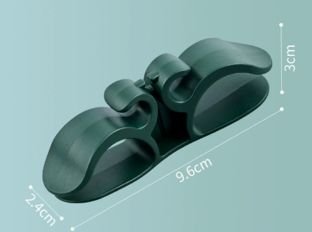 Self-adhesive silicone cable holder for home appliances