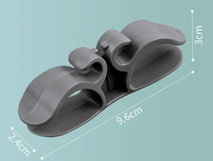 Self-adhesive silicone cable holder for home appliances
