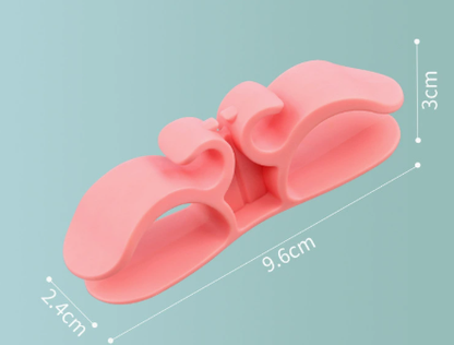 Self-adhesive silicone cable holder for home appliances